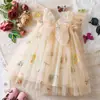 Vestido de Verano 2026 Nuevo sin Espalda con Alas Brillantes y Mariposas Bordadas, Vestido de Malla Estilo Coreano con Tirantes de Princesa para Niñas
