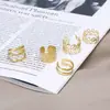 Shein Clip para Hélice de Oreja Hueso Creativo Simple Sin Perforar Juego de Cinco Piezas Pendientes Personalizados Dorados con Corte de Hoja Clip de Oreja en Forma de C