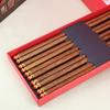 Cabeza de cobre bambú ala de pollo madera sándalo rojo palillos 5/10 caja de regalo doble madera maciza palillos domésticos grabado de logotipo venta al por mayor