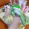 Llavero de Galleta Labubu de Oro Puro 999 de 20Mg Cadena para Teléfono Móvil Colgante Regalo para Novia Colgante de Bolsa de Dibujos Animados Pequeño Regalo
