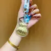 Chaveiro Pingente de Bolsa de Presente em Ouro Puro 999 Personalizado no mesmo estilo de Shuibei, para boa sorte e prosperidade, adequado para promoção em transmissões ao vivo