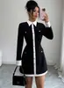 Vestido de malha com botões decorados e blocos de cor, estilo europeu e americano, para mulheres, novo modelo 2026, ajustado ao corpo, para venda transfronteiriça da Amazon