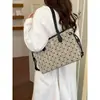 Bolso de mano elegante y de alta gama de gran capacidad para mujer, nueva colección 2026, adecuado para el trabajo diario, con diseño de lunares y rayas, y se puede llevar como bolso de hombro o bolso tote