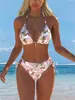 Traje de baño bikini de color liso europeo y americano, sexy y moderno bikini de tres piezas, nuevo modelo 2027, trajes de baño al por mayor para vacaciones en la playa