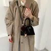 Bolsa bucket casual outono e inverno para mulheres, estilo retrô, adequada para trabalho e deslocamento, novo modelo 2026, grande capacidade, bolsa transversal