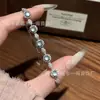 Venta al por mayor del Fabricante: Pulsera de Jade Azul Natural Xiaohongshu con Incrustaciones de Plata S925, Diseño Fresco y Delicado
