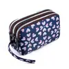 Venta al por mayor de fábrica nueva cartera monedero bolso femenino coreano estampado cartera bolso para teléfono móvil cartera de dama bolso de tela para correr