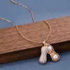 Colar Clássico de Trevo de Quatro Folhas em Aço Titânio Japonês e Coreano da Moda para Mulheres, Elegante e Luxuosa Corrente de Clavícula com Zircônia, Acessório Versátil Exquisito