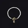 Pulsera de Moda de Venta Caliente Transfronteriza 2026 con Diamantes y 26 Letras, Pulsera de Perlas de Imitación Ovaladas, Disponible para Venta al por Mayor para Mujeres