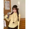 Camiseta básica de cuello medio para mujer 2026 nuevo suéter de punto para otoño e invierno, extremadamente elegante con un diseño único y bordes con volantes