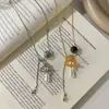 Collar con Colgante de Ojo de Tigre Forma de Gota de Agua de Saturno, Cadena de Suéter de Lujo Ligero para Espalda Baja de Emperatriz, Nueva Cadena para Clavícula de Otoño e Invierno