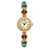 Goldie de Segunda Mano Lujo Ligero Gama Alta Reloj Pulsera Colorido Nicho Gama Alta Cadena Ojo de Gato Reloj de Cuarzo