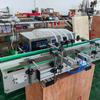 Máquina llenadora automática de líquidos de cuatro cabezales, línea de llenado de agua CNC de escritorio, máquina llenadora inteligente de jugos, bebidas y leche.