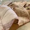 Lujoso y elegante juego de ropa de cama de cuatro piezas de algodón con acabado cepillado, que incluye una funda de edredón de jacquard de algodón puro, una sábana y una sábana ajustable.
