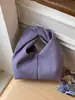 Bolso de Mano Plegado de Diseño de Nicho para Mujer 2026 Nuevo Bolso de Hombro/Axila de Gran Capacidad para Viajes Diarios Estilo Coreano Bolso Cubo