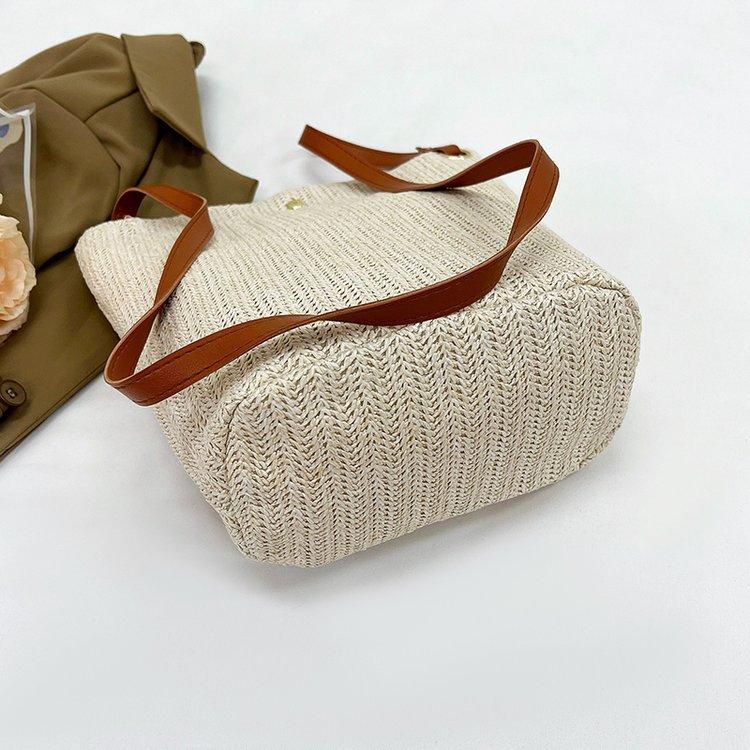 编织包女包新款潮2024夏草编简约百搭小清新水桶包个性单肩斜
