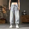 Jeans masculinos estilo minimalista japonês, moda de rua retrô, novo outono 2026, calças retas largas, calças masculinas de marca da moda
