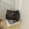 Bolso de hombro con cadena de patrón de diamante de alta gama transfronterizo, bolso tote de moda de lujo ligero, bolso de axila con diseño de nicho elegante