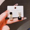 S925 agulha de prata estilo coreano pequeno Chanel estilo assimétrico preto e branco cristal brincos de orelha Stud moda leve estilo de luxo all-match brincos