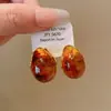 Pendientes de borla con carcasa de madera marrón transfronterizos europeos y americanos, pendientes de estilo vintage Maillard, pendientes de mujer de lujo ligero de alta gama