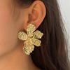 Transfronterizo Europa y Estados Unidos moda simple textura de pliegues irregulares aretes de flores creativos únicos mujeres viajeras diarias