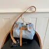 Bolsa tote de gran capacidad Shuai Mi Jia para mujer, nuevo modelo de verano 2026, elegante y atractiva, adecuada para ir al trabajo, bolso de hombro y cruzado
