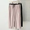Pantalones casuales de aire acondicionado para hermana gordita de 200 jin, nuevos de verano, talla grande, cubren la carne, ligeros y finos, de Lyocell, de ocho puntos, para mujer 0585