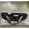 Adecuado para Nissan 2014 Qijun 62310-4CL0A Rejilla central delantera B con agujero para cámara