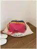Versión coreana 2026 nueva bolsa para mujer con decoración de dopamina, bolso cruzado de moda, mochila portátil para deportes al aire libre y senderismo