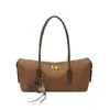 Bolso tipo baguette de gamuza de gran capacidad estilo relajado transfronterizo para mujer, versión coreana popular, textura de nicho, bolso de hombro único para debajo del brazo para mujer