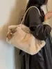 Nova Bolsa de Pelúcia Fofa Outono/Inverno 2026 Moda Feminina Bolsa Transversal Simples Bolsa de Ombro Único Portátil de Alto Valor Estético