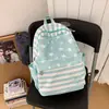 Mochila feminina transfronteiriça 2026 estilo coreano, design de bolinhas, fofa, adequada para alunos do ensino fundamental e médio