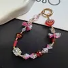 Colgante de campanilla exótico versátil de moda cadena corta funda de teléfono universal llavero accesorio para bolso
