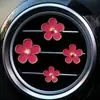 Pequeño crisantemo perfume para coche joyería aleación pequeña margarita flor de cinco pétalos flor clip decoración salida de aire del coche perfume