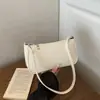 Design de nicho francês versão coreana versátil bolsa baguette padrão crocodilo bolsa de ombro retrô 2026 nova bolsa de mão bolsa de ombro