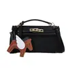 Bolso de mujer de alta calidad 2026 nueva moda bolso cruzado versátil bolso de mano exquisito súper popular bolso Kelly bolso cuadrado pequeño