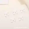 Jóias de unha de arco explosivo resina tridimensional pequeno arco diy decoração de unhas acessórios Joker atacado