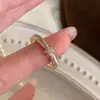 Anillo de doble capa anudado para mujer, estilo ins, lujo ligero, alta gama, elegante, exquisito, versátil, joyería de anillo con goteo de aceite chapado en oro