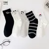 Calcetines para niñas Yishuangshuang, nuevos calcetines de otoño e invierno con forma de corazón de dibujos animados hasta la mitad de la pantorrilla, algodón peinado, calcetines estilo Miu con letras y caras sonrientes para estudiantes
