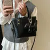 Bolso de Mano Pequeño Versátil y de Moda para Mujer, Nuevo Bolso Cubo Vintage Invierno 2025, Bolso Cruzado Texturizado de Nicho de Alta Calidad