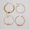 Moda Joyería Transfronteriza Nicho Pulsera de Gemas Ojos Verdes Incrustada con Diamantes Set Personalizado Pulsera Abierta en Forma de Serpiente Juego de Cuatro Piezas para Mujeres