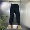 Nuevos pantalones casuales para hombre, a prueba de viento, elegantes, cómodos y a la moda, para otoño e invierno, cálidos, estilo business casual, tendencia invernal de alta gama