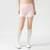 Shorts deportivos de secado rápido de cintura alta con rayas de colores contrastantes en los lados, control y moldeado de abdomen, adecuados para fitness al aire libre y yoga