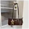 Bolso de hombro tipo baguette de cuero casual de moda transfronterizo, estilo chic nuevo de Instagram, para mujer, primavera-verano 2026