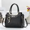 Bolso tejido versátil para mujer transfronterizo, estilo nuevo, textura de lujo ligero, de un solo hombro y cruzado, moderno y elegante