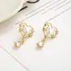 Pendientes de Amor de Perla Retro Franceses Simples Transfronterizos Lujo Ligero Nicho Elegante Diseño de Alta Gama Pendientes Colgantes de Gota de Agua