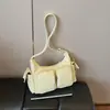 Bolso de axila de nicho coreano para mujer 2024 Nuevo Vintage Simple de alta gama Bolso cruzado Dulce Fresco Bolso de motociclista