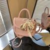 Bolsa de Mão Tecida de Entrada Elegante de Luxo de Nicho Feminina 2025 Nova Moda Versátil para Trabalho Ombro Transversal Sela