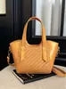 Bolso de mano de alta costura nuevo de principios de otoño Yuezhi 2026, bolso tipo cubo vintage para el día a día, bolso versátil de hombro y cruzado