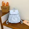 Nueva mochila escolar simple transfronteriza, versátil para estudiantes de secundaria y preparatoria, mochila de viaje de gran capacidad con compartimento para laptop